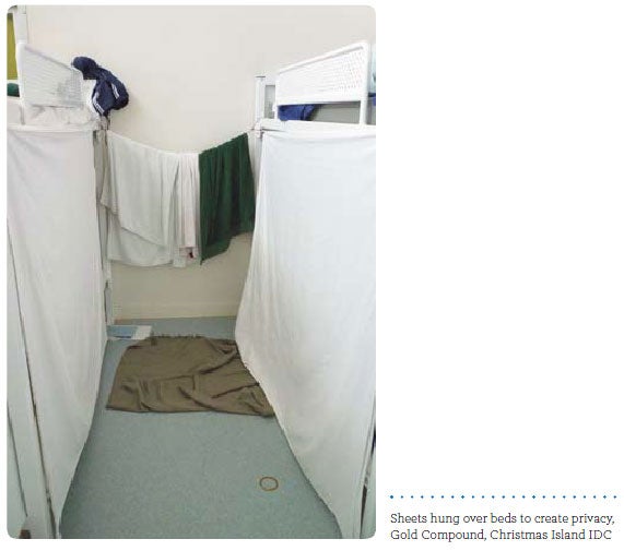 Sheets hung over beds to create privacy, Gold Compound, Christmas Island IDC