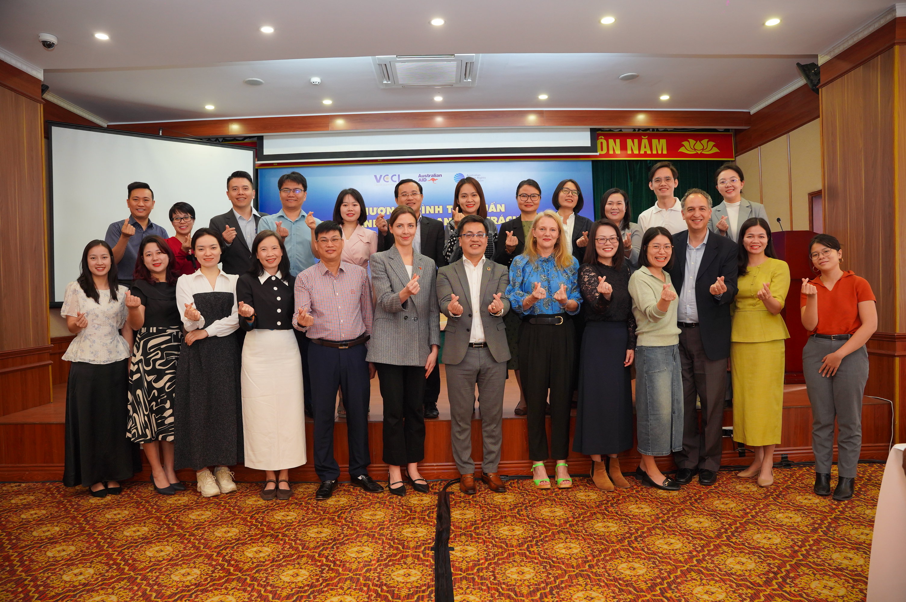 Group of smiling people at conference