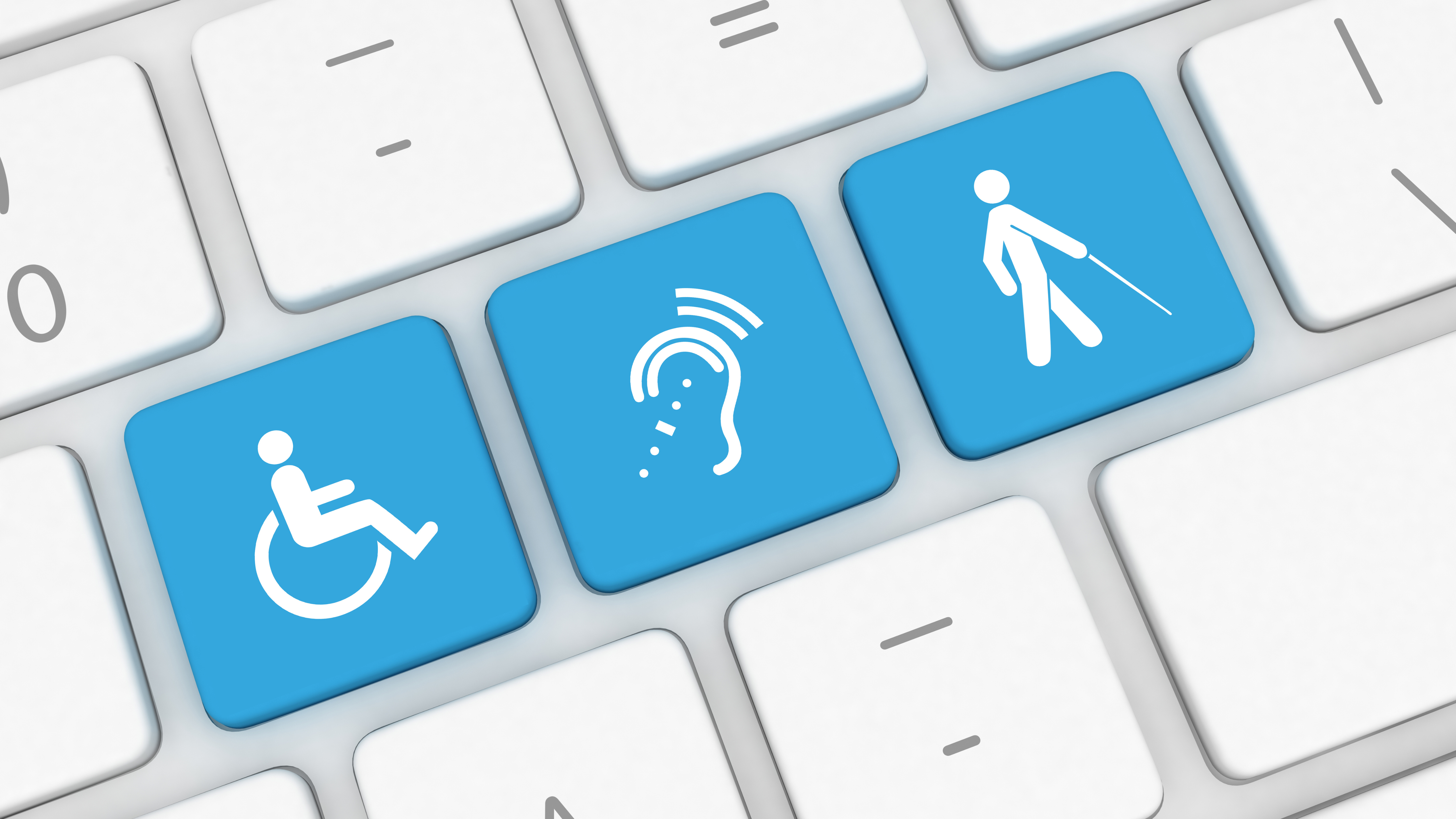 buttons on a keyboard coloured blue and with the symbols for vision impairment, hearing impairment and wheelchair user