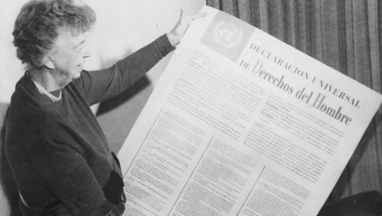 Eleanor Roosevelt holds up the Universal Declaration of Human Rights in Paris, 1948.