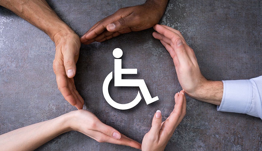 people's hands encircling a disability icon