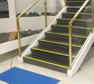 Incorrect: no handrail extension at bottom of stairs