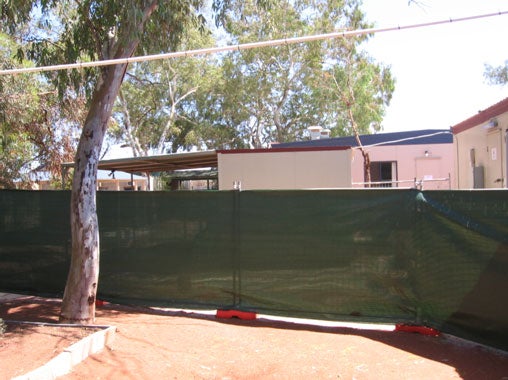 View from external areas of fence surrounding Leonora immigration detention facility