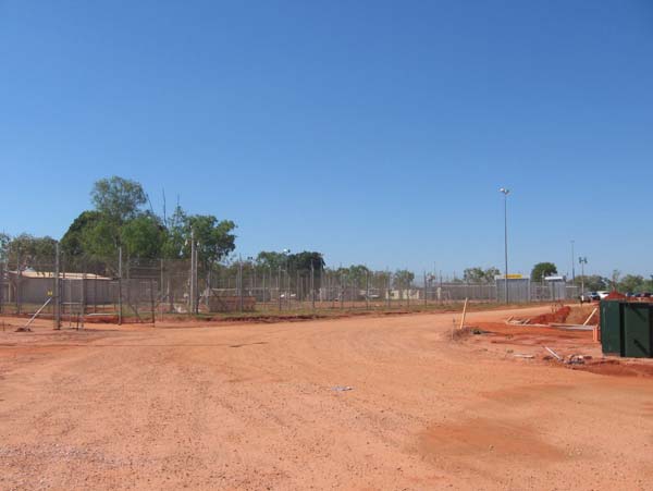 Perimeter fences of Curtin IDC (left) and construction area (right)
