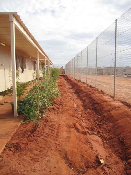 Accommodation compound (left) and perimeter fence (right), Curtin IDC