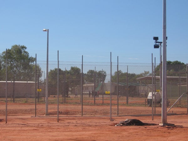 Looking into Curtin IDC through perimeter fence