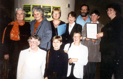 Image: Brenda Harrison receiving a Shizophrenia Fellowship award at Monash University