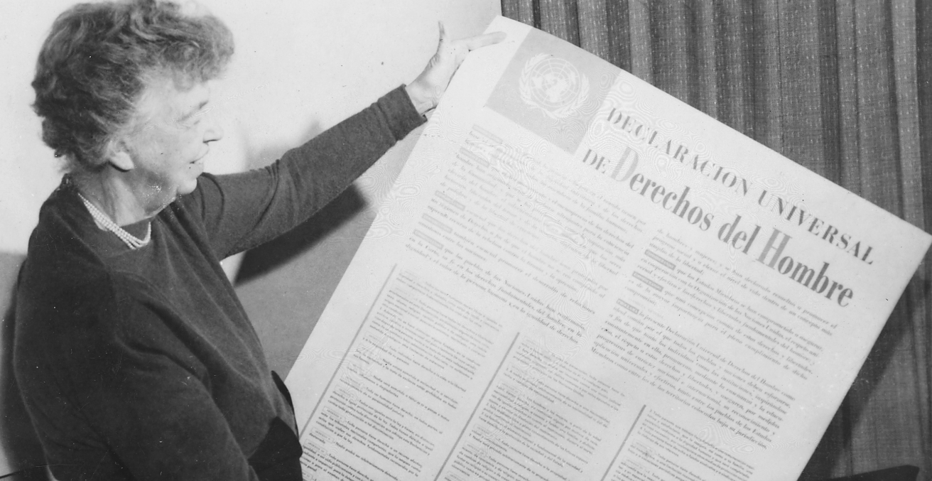 Eleanor Roosevelt holds up the Universal Declaration of Human Rights in Paris, 1948.