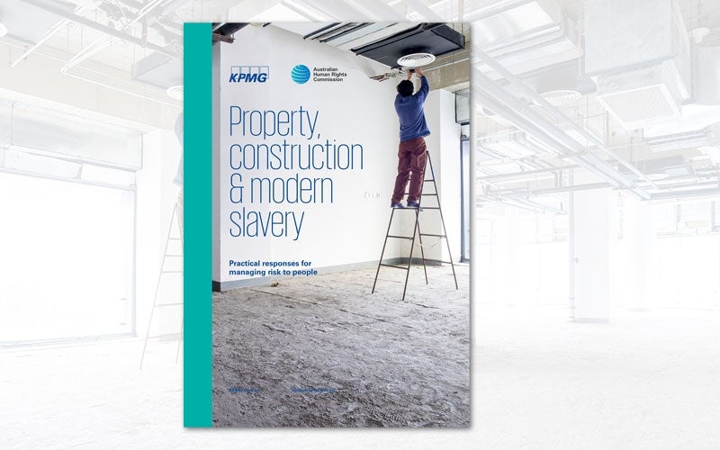 Man on ladder on building site. Modern Slavery construction industry cover. 
