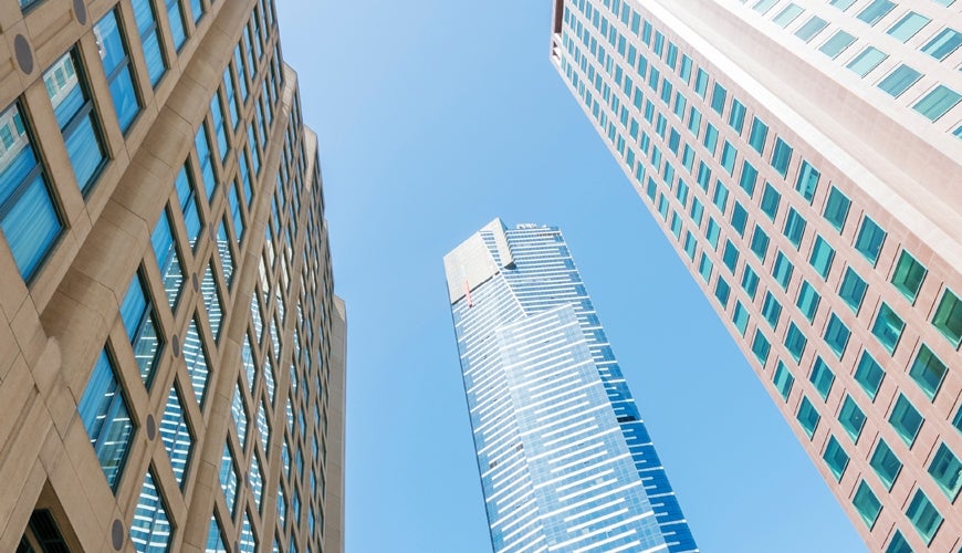 High rise hotels against a blue sky