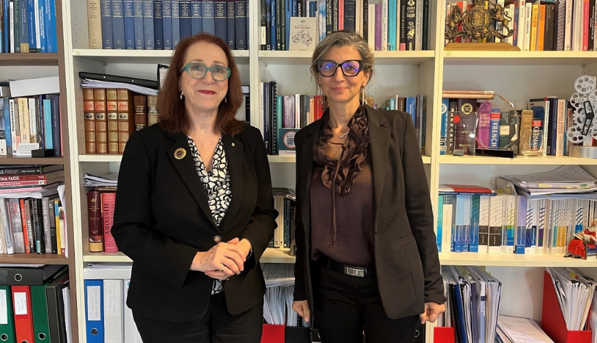 Commission President Emeritus Professor Rosalind Croucher AM, a woman wearing glasses and a black suit, standing next to Francesca Albanese, the United Nations Special Rapporteur on the situation of human rights in the Palestinian Territory occupied since 1967, a woman wearing a black suit and glasses.