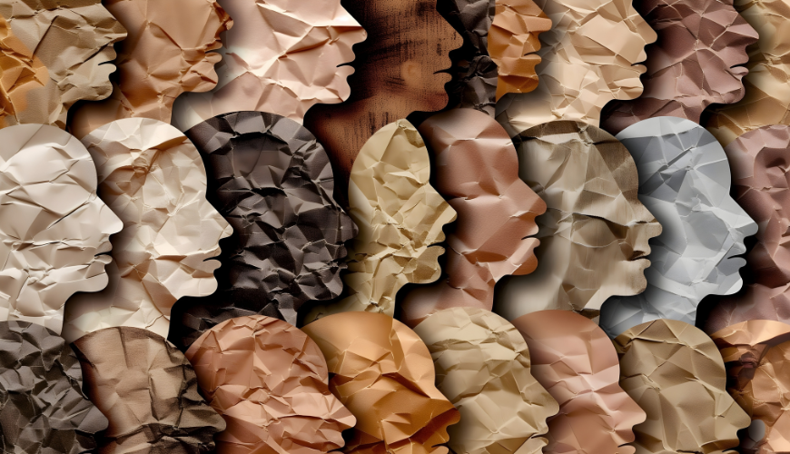 A collage of blank faces made of paper of varying colours and textures