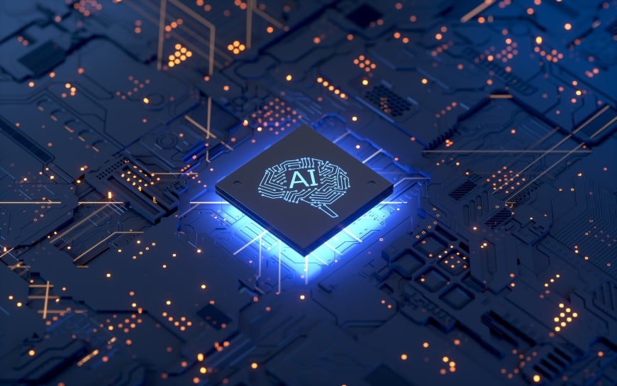 A microchip with the letters "A.I." written on it.
