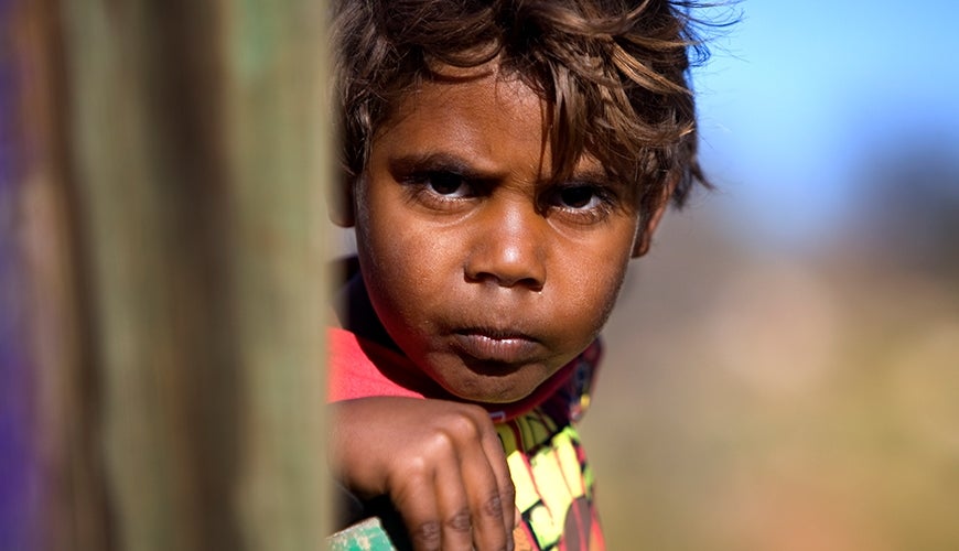 serious looking Aboriginal boy