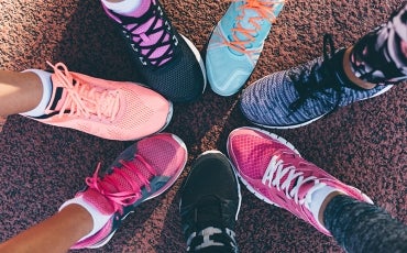 colourful range of runnning shoes in a circle