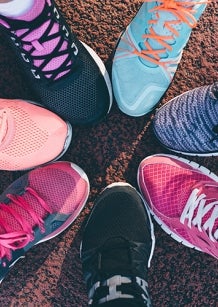 colourful range of runnning shoes in a circle