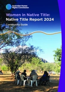 First Nations women meet in a circle in the bush