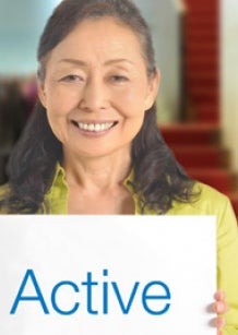 older woman with a sign "Active"
