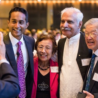 Jeremy Fernandez takes a photo with attendees at 2018 Human Rights Awards