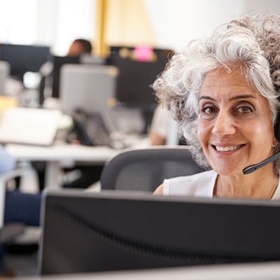 older woman on telephone help line