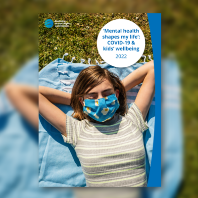 cover photo for report - girl with mask laying in the sun outside