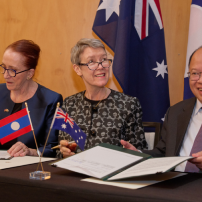 Commission President Emeritus Professor Rosalind Croucher AM, Australia’s Ambassador for Human Rights Brontë Moules and Phoukhong Sisoulath, Director General of the Department of Treaty and Law within the Lao Ministry of Foreign Affairs signing the memorandum of understanding.  